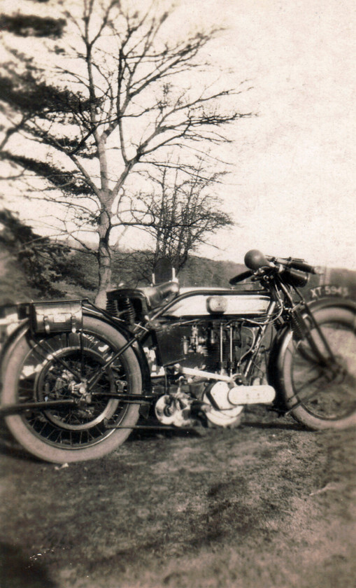 fsMotorbike1 
 A Norton motorcycle parked by the road in England in the 1920s, UK. 
 Keywords: 1920s, 1930s, Black and White, England, Flo Smith, Great Britain, Monochrome, motorcycle, Norton, parked, Photography, Pre-war, retro BW UK British Great Britain classic motorbike early 20th century black white motoring heritage archive, road, vintage