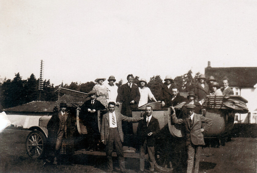 fsSharabang 
 A group of friends and family standing on a sharabang in the English countryside in the 1920s, England, UK. 
 Keywords: 1920s, 1930s, Black and White, England, English countryside, family, Flo Smith, friends, Great Britain, group, Monochrome, Photography, Pre-war, retro classic big massive car vehicle archive adults 20s 30s group people men women people British smart suit hats dresses early 20th Century black white transport adult standing smiling monochrome traditional fun dapper elegant social history historic country, sharabang, standing, vintage